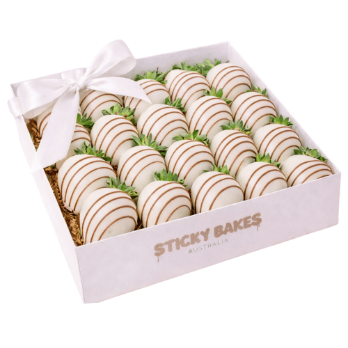 Fresh strawberries dipped in premium, smooth white chocolate in a white box.