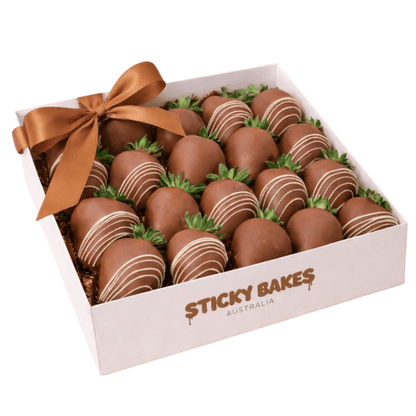 Fresh strawberries dipped in premium, smooth milk chocolate in a white box. 